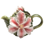 Cosmos Gifts Corp - Lily Teapot, 8 oz. - The Lily Teapot makes an elegant addition to a tea party. This hand-painted green ceramic teapot features stunning white and pink lily decorations and leaf ornaments. Holds 8 ounces. Hand wash only.