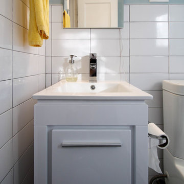 East Denver Minimalist White Bathroom & Kitchen Renovation