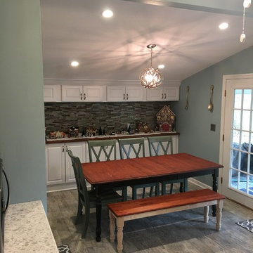 Opened wall and transformed closed room to eat-in kitchen with storage and new f