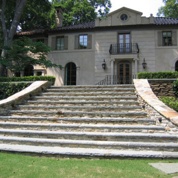 Grand Staircase in Fieldstone and Bluestone; Entry shows Limestone Facade
