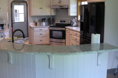 Example of a farmhouse kitchen design in Other