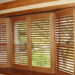 Shutters in a bay window. - Interior Shutters