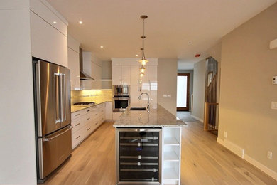 Example of a mid-sized trendy kitchen design in Calgary