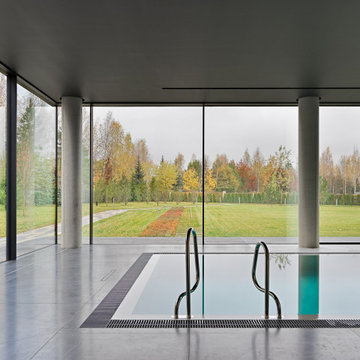 Дом из архитектурного бетона в поселке “Миллениум Парк”