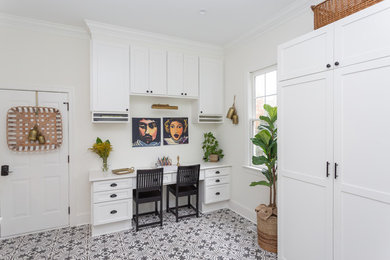 Inspiration for an eclectic laundry room remodel in Raleigh