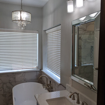 Marble and espresso bathroom