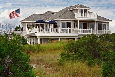 Inspiration for a large coastal gray two-story wood exterior home remodel in Philadelphia