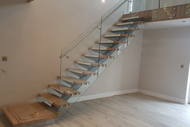 Contemporary glass & stainless steel staircase