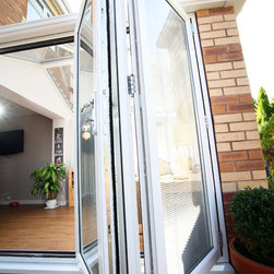 White Conservatory with PVCu Bi-Fold Doors - Products