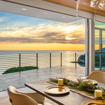 The Bluff house dining room with sunset view in Pismo Beach
