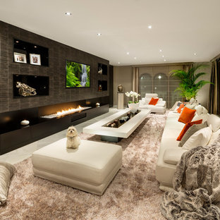 Inspiration for a large classic enclosed home cinema in Other with multi-coloured walls, porcelain flooring and a wall mounted tv.