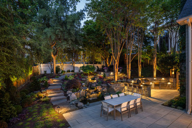 Inspiration for a timeless backyard concrete paver patio kitchen remodel in DC Metro