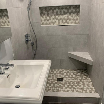 Fully Tiled Gray Bathroom Remodel with Mosaic Tile