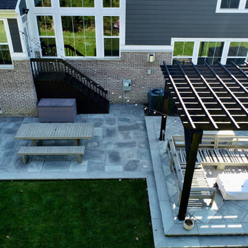 Multi-Level Unilock Paver Patio and Custom Cedar Pergola