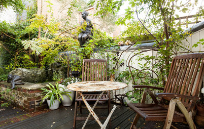 Garden Tour: A Tiny Haven Made Magical With Lush Plants and Vintage Art