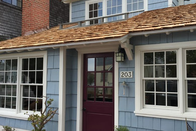 Inspiration for a coastal exterior home remodel in Orange County