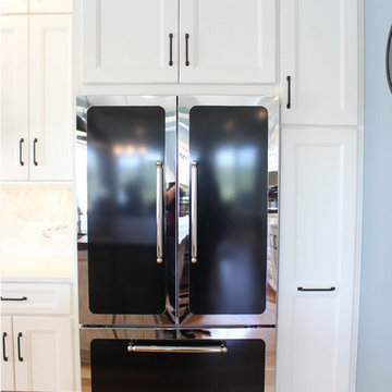White and Gray Kitchen with Massive Storage Solutions