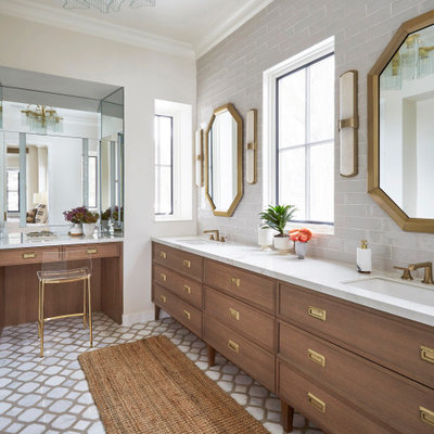 Example of a transitional master gray tile double-sink bathroom design in Chicago with brown cabinets, white countertops and a freestanding vanity