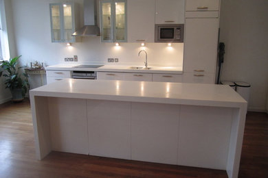 White High Gloss Magnet Kitchen With Corian Worktops & Neff Appliances