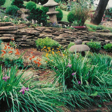 Asian artifacts provide texture and interest to the landscape.