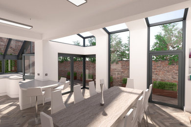 Inspiration for a contemporary l-shaped open plan kitchen in West Midlands with an island.