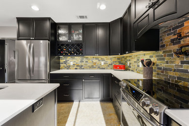 Example of a mid-sized trendy l-shaped porcelain tile and beige floor kitchen pantry design in Jacksonville with a double-bowl sink, recessed-panel cabinets, dark wood cabinets, quartz countertops, yellow backsplash, stone tile backsplash, stainless steel appliances, an island and white countertops