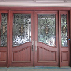 Wood With Wrought Iron - Front Doors