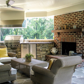 Porch with built-in kitchen and fireplace
