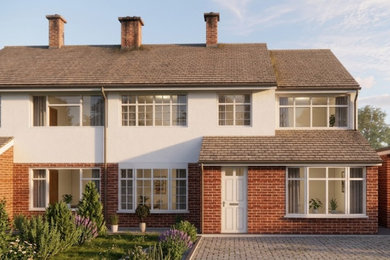 Photo of a multi-coloured two floor brick and front house exterior in Essex with a pitched roof, a tiled roof and a brown roof.