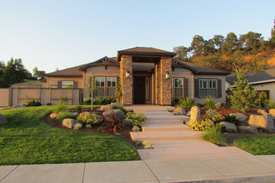 Example of a mid-sized transitional beige two-story mixed siding house exterior design in Sacramento with a hip roof and a shingle roof