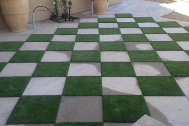 Photo of a mid-sized southwestern partial sun side yard stone garden path in Phoenix.