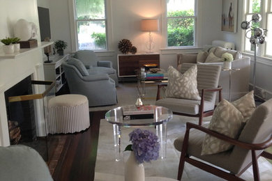 Example of a transitional living room design in New York