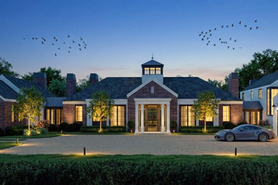 Huge traditional two-story brick exterior home idea