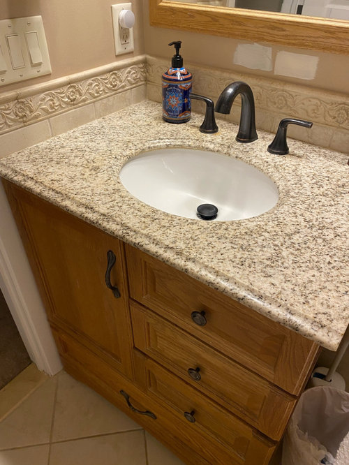 ideas to spruce up bathroom on a budget?