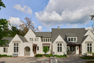 Transitional white two-story painted brick house exterior photo in Chicago with a gray roof