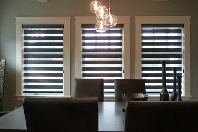 Transitional dining room photo in Vancouver