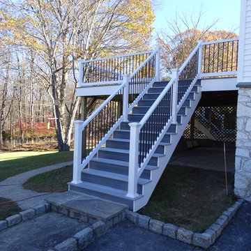 Raised Deck with attached Patio with fireplace