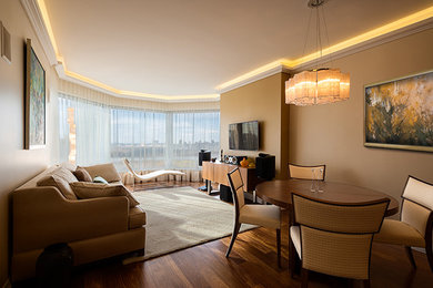 Living room - mid-sized contemporary formal and open concept medium tone wood floor living room idea in New York with brown walls and a wall-mounted tv