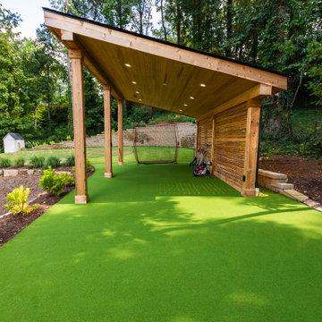Covered Backyard Putting Green with Modern Wooden Pavilion