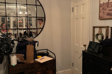 Example of a mid-sized minimalist foyer design in New York