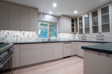 Example of a transitional kitchen design in San Diego