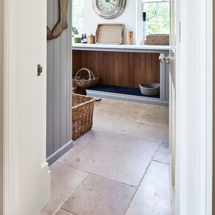 Contemporary utility room in Wiltshire with limestone flooring.