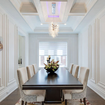Wainscoting, baseboards, crown moulding, waffle ceilings