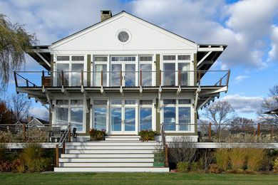 Inspiration for a coastal two-story exterior home remodel in New York