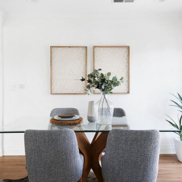 Neutral Dining Room with Glass Top Table
