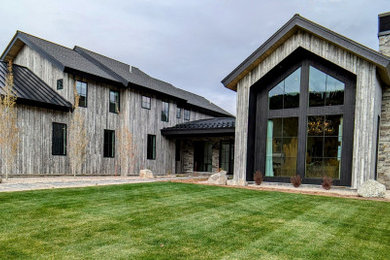 Example of a cottage exterior home design in Other
