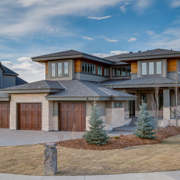 Custom 2 Storey Backing on to cascading ponds