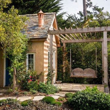 Garden arbor and swing in Pebble Beach courtyard