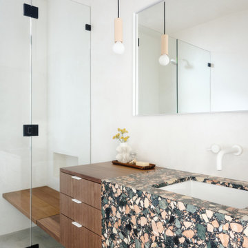 Bathroom with bold multicolor terrazzo, shower detail - Fold House