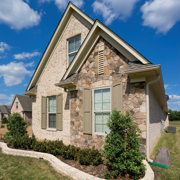 Nottingham Tudor Brick & Tennessee Fieldstone Rock Home - Tennessee